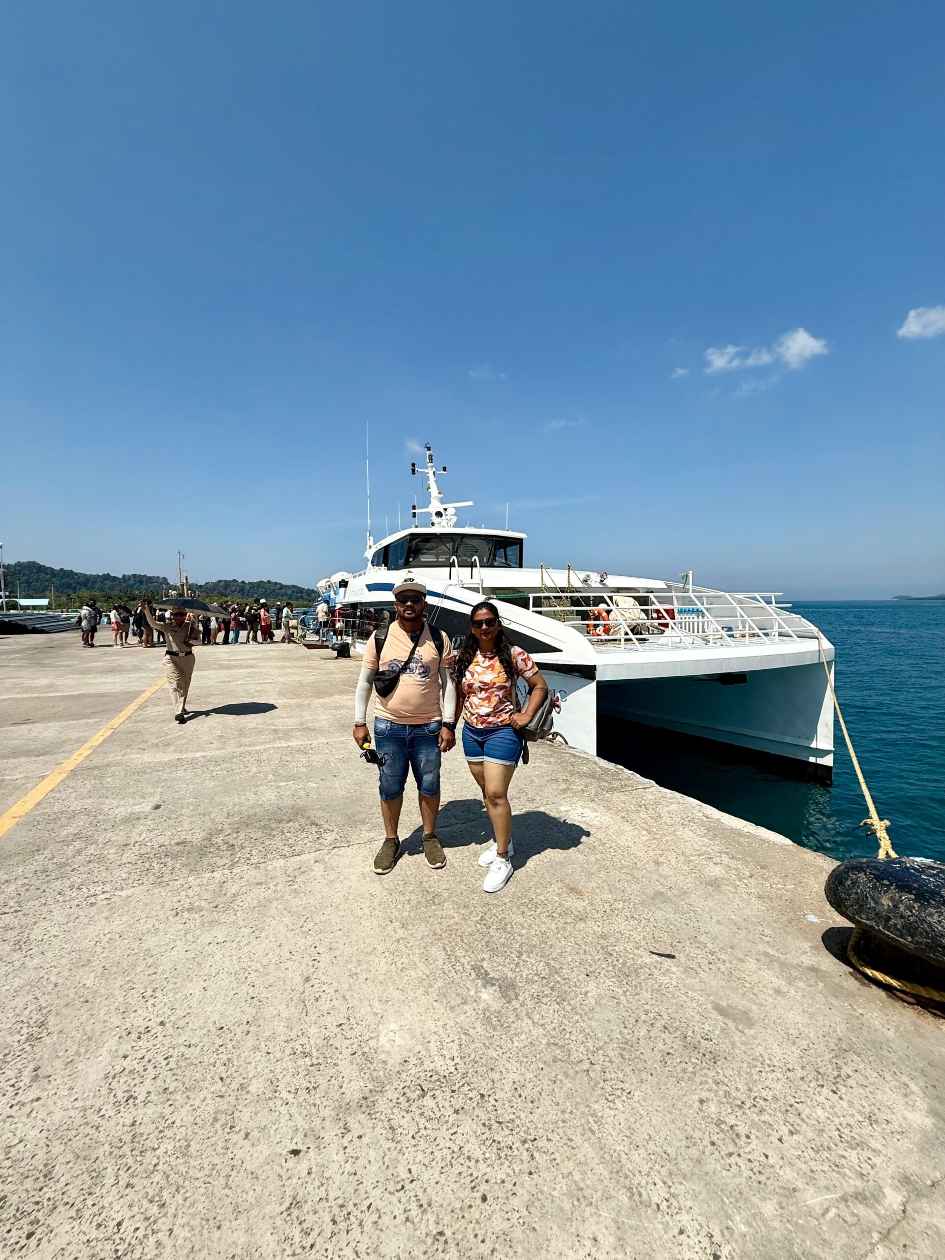 A couple standing in front of ITT Majestic Ferry