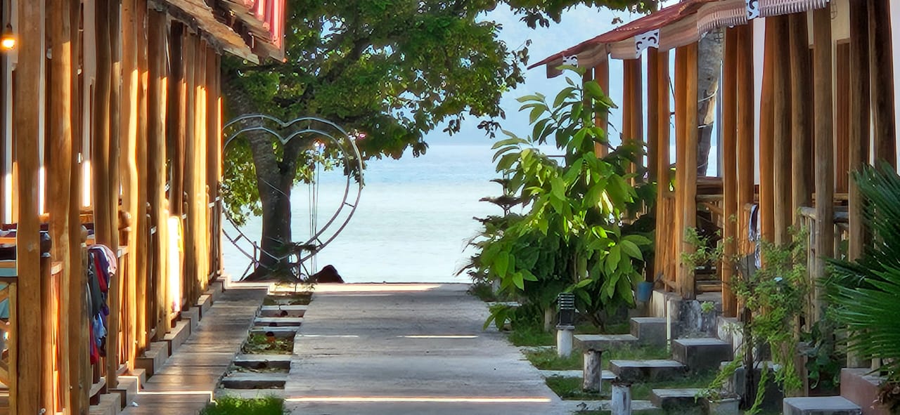 Beachfront wooden cottages opening straight onto the sea at Havelock Exotica on the Govind Nagar lane